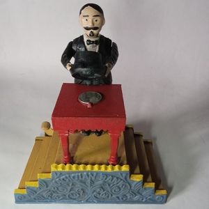 Vantage cast iron, mechanical bank. For boys or girls. But there is no plug.